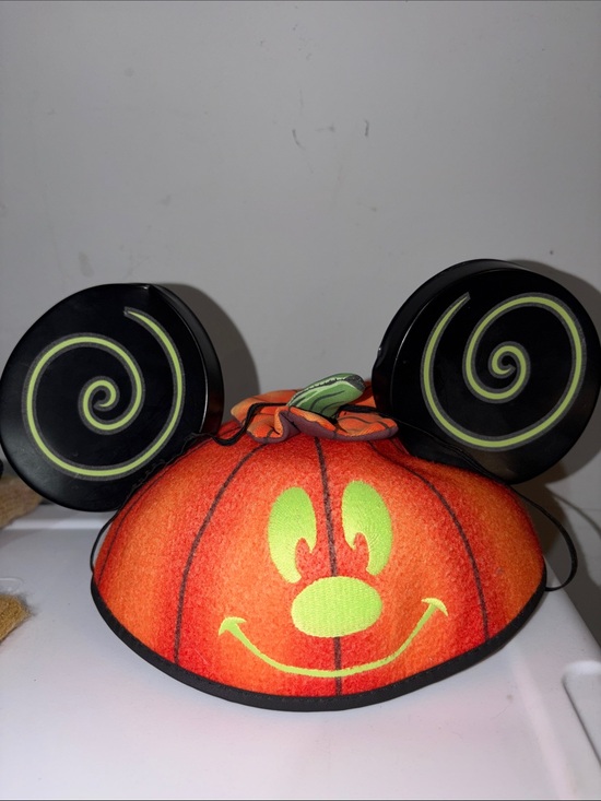 Authentic Disney’s glow n dark Anniversary Orange mickey pumpkin Minnie EarswTAG